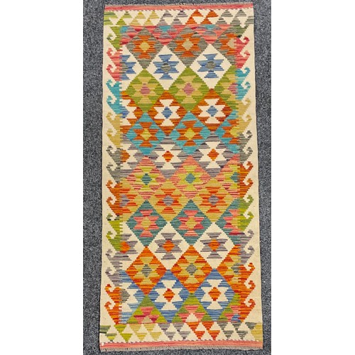 548 - Oriental Rugs and Carpets - a Chobi Kilim runner, 157cm x 69cm