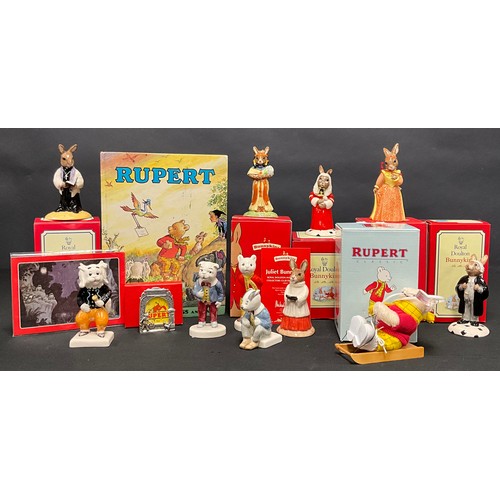 599 - A set of four Beswick Rupert and His Friends, models, Rupert The Bear, Ping Pong, Bill Badger, Algy ... 