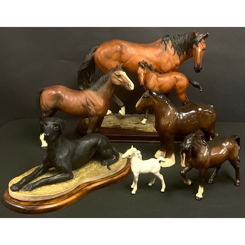 615 - A large Leonards Collection model of a horse and foal; a Beswick model of a shire horse; other horse... 