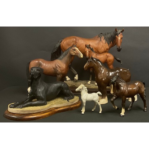 615 - A large Leonards Collection model of a horse and foal; a Beswick model of a shire horse; other horse... 