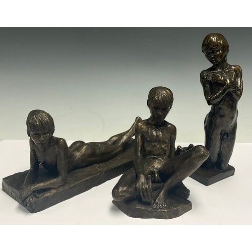 622 - Neil Godfrey, a resin sculpture, reclining nude male, 26cm long, signed, dated 1987; two other simil... 