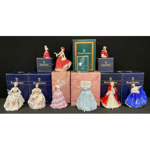 626 - A Royal Doulton figure, Christmas Day 1999, HN 4214, certificate, boxed; others, Diana HN 2468, boxe... 