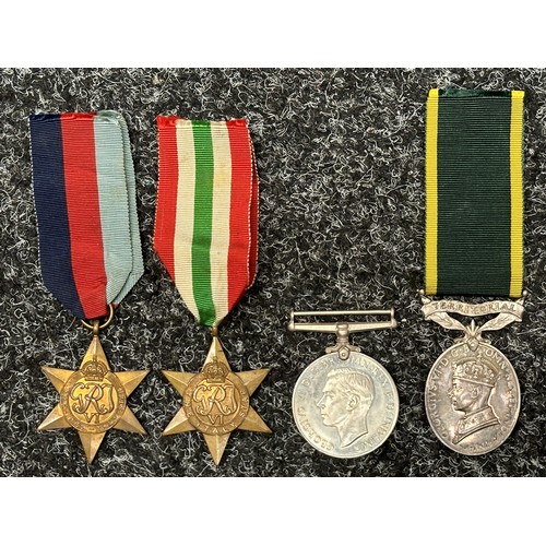 2047 - WW2 British Medal group comprising of: 1939-45 Star, Italy Star, Defence Medal and GR VI Territorial... 