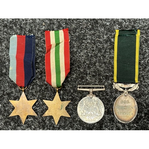 2047 - WW2 British Medal group comprising of: 1939-45 Star, Italy Star, Defence Medal and GR VI Territorial... 