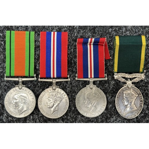 2056 - WW2 British Defence Medal, 1939-45 British War Medal x 2 and Territorial Efficency Medal (Name erase... 