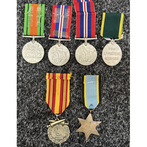 2056 - WW2 British Defence Medal, 1939-45 British War Medal x 2 and Territorial Efficency Medal (Name erase... 