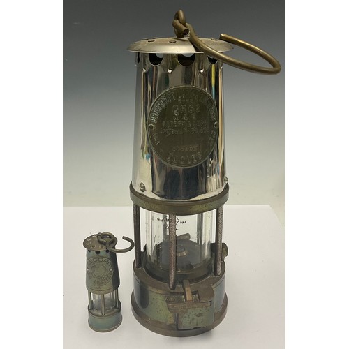 643 - A Eccles miner's lamp, The Protector; a miniature miner's lamp (2)