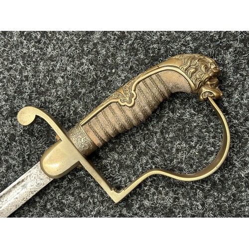 2126 - Imperial German Army Officers Lion Head Sword with curved, fullered blade with etched decoration 886... 