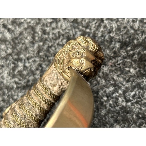 2126 - Imperial German Army Officers Lion Head Sword with curved, fullered blade with etched decoration 886... 