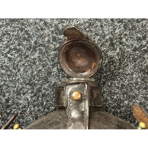 2141 - US Civil War Era Glass Canteen in Black Leather Carrier. Brass suspension hooks. No markings.