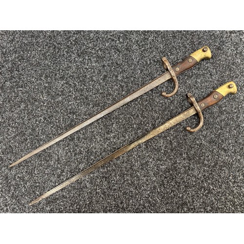 2145 - Pair of French MLE 74 Gras Bayonets, both without scabbards. One dated 1875 and the other 1876. Both... 