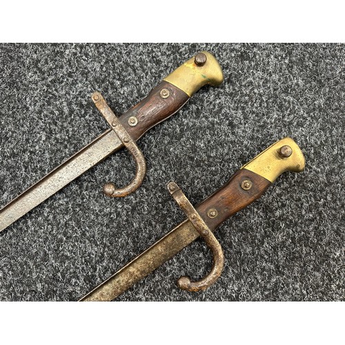 2145 - Pair of French MLE 74 Gras Bayonets, both without scabbards. One dated 1875 and the other 1876. Both... 