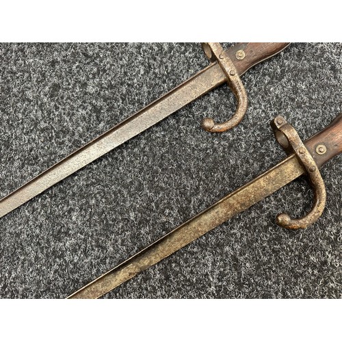 2145 - Pair of French MLE 74 Gras Bayonets, both without scabbards. One dated 1875 and the other 1876. Both... 