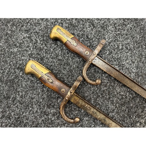 2145 - Pair of French MLE 74 Gras Bayonets, both without scabbards. One dated 1875 and the other 1876. Both... 