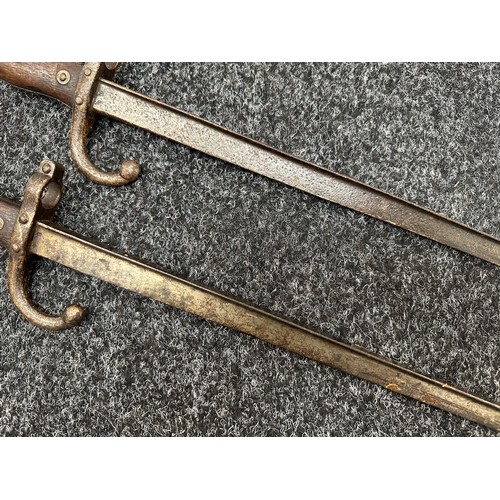 2145 - Pair of French MLE 74 Gras Bayonets, both without scabbards. One dated 1875 and the other 1876. Both... 