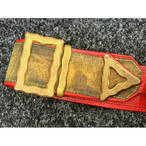 2176 - British Officers Cross Belt and Pouch. Heavy gilt plated lid to the pouch. Red leather backed belt.