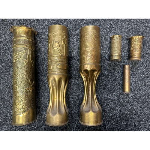 2181 - WW1 French Trench Art: three ornate vases made from French 75mm cases and two Candlesticks from 37-8... 