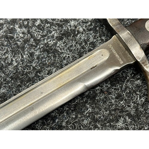 2210 - Finnish M28 Civil Guard Bayonet with single edged fullered blade 300mm in length, maker marked 