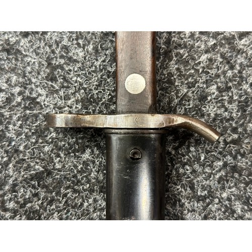 2210 - Finnish M28 Civil Guard Bayonet with single edged fullered blade 300mm in length, maker marked 