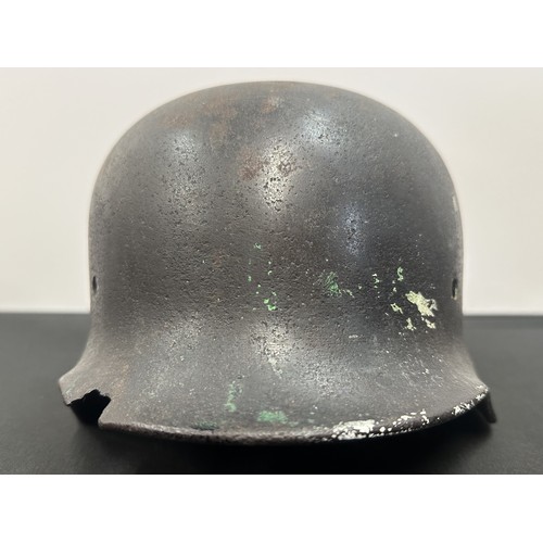 2302 - WW2 Third Reich M40 Pattern Steel Helmet battle damaged Normady relic. Shrapnel damage to the visor ... 