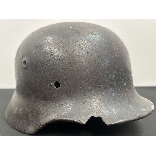 2302 - WW2 Third Reich M40 Pattern Steel Helmet battle damaged Normady relic. Shrapnel damage to the visor ... 