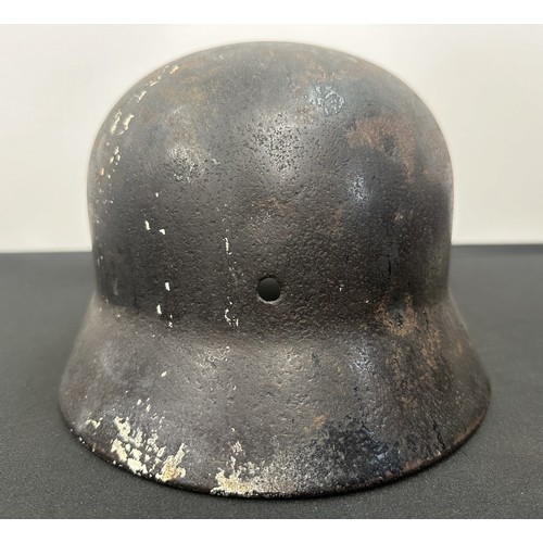 2302 - WW2 Third Reich M40 Pattern Steel Helmet battle damaged Normady relic. Shrapnel damage to the visor ... 