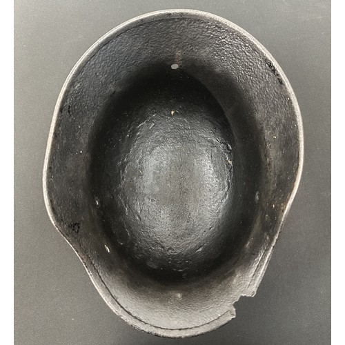 2302 - WW2 Third Reich M40 Pattern Steel Helmet battle damaged Normady relic. Shrapnel damage to the visor ... 