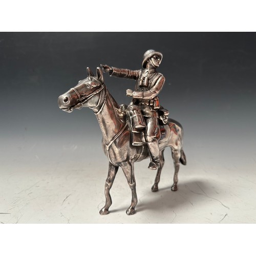 2308 - WW2 Third Reich Heer Desk Ornament of a mounted Cavalryman. 230mm in height. Length 245mm. Reins are... 