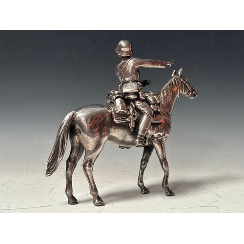 2308 - WW2 Third Reich Heer Desk Ornament of a mounted Cavalryman. 230mm in height. Length 245mm. Reins are... 