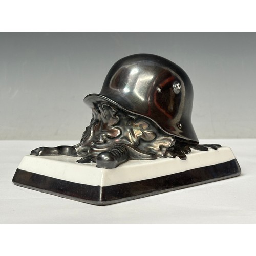 2318 - WW2 Third Reich Desk Ornament of an M16 steel helmet with Crossed Swords and Oakleaves by Rosenthal ... 