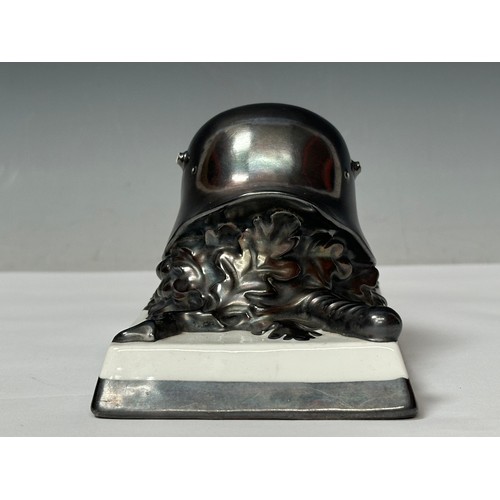 2318 - WW2 Third Reich Desk Ornament of an M16 steel helmet with Crossed Swords and Oakleaves by Rosenthal ... 