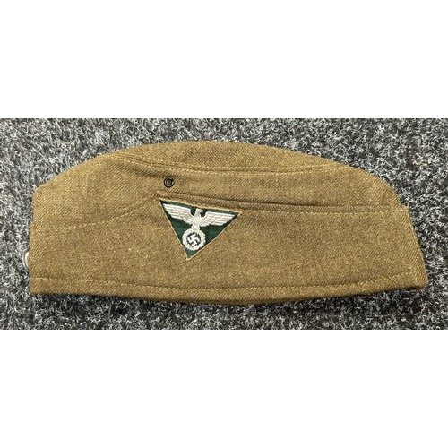 2337 - WW2 Third Reich SA Lagermutze complete with triangular Bevo flatwire eagle insignia with green backi... 