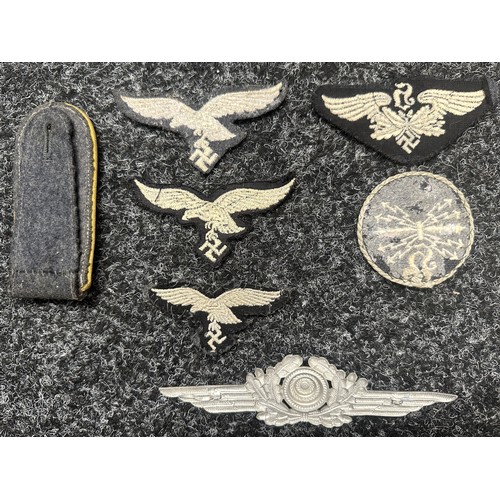 2349 - WW2 Third Reich Luftwaffe insignia collection to include: Two uniform removed breast eagles: Uniform... 