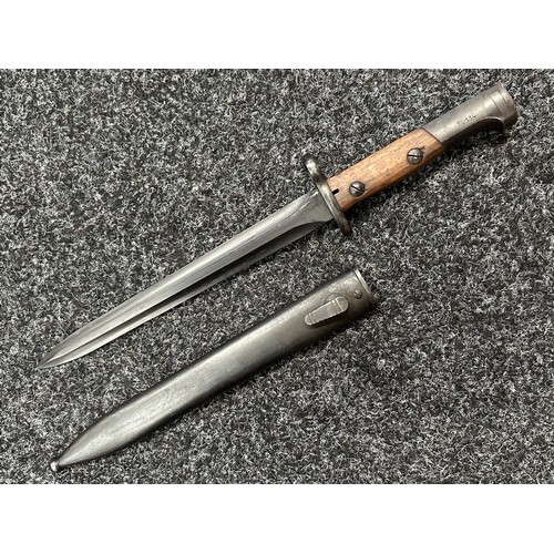 2377 - Egyptian Contract FN49 Bayonet with double edged double fullered blade 226mm in length. Wooden grips... 