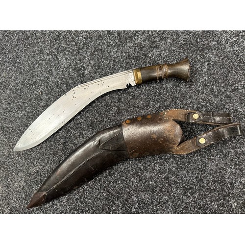 2388 - Gurhka Kukri knife with single edged blade 290mm in length. Horn grip. Overall length 400mm. Brass c... 