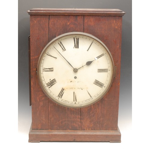 665 - An early 20th century oak officer’s mess type wall or mantel clock, 30.5cm circular dial, fusee move... 