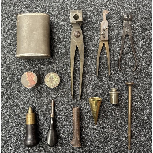 2424 - A collection of Bullet Moulds, Oil Can, Tools, Percussion Cap tins, etc