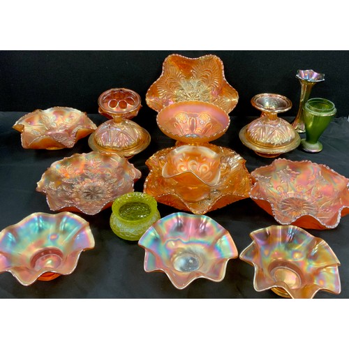 75 - Early 20th century carnival glass including; frilled edge bowls, dishes and lidded pots; etc