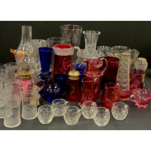 78 - 19th century glass and later including; Cranberry glass jugs, beakers, vases, a oil lamp; Bristol Bl... 