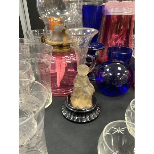 78 - 19th century glass and later including; Cranberry glass jugs, beakers, vases, a oil lamp; Bristol Bl... 