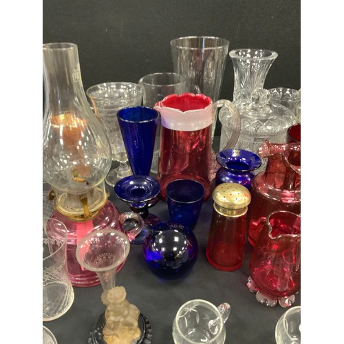 78 - 19th century glass and later including; Cranberry glass jugs, beakers, vases, a oil lamp; Bristol Bl... 