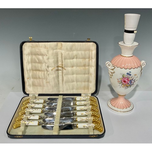 13 - A set of Royal Crown Derby Vine pattern pastry knives and forks, each terminal modelled as a bunch o... 