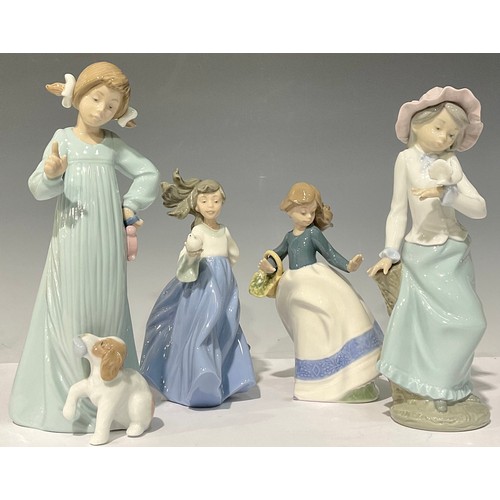 40 - A Nao by Lladro figure, 'Bad Boy', 25.5cm high; others, Girl with Dove, Girl with Basket of Flowers,... 