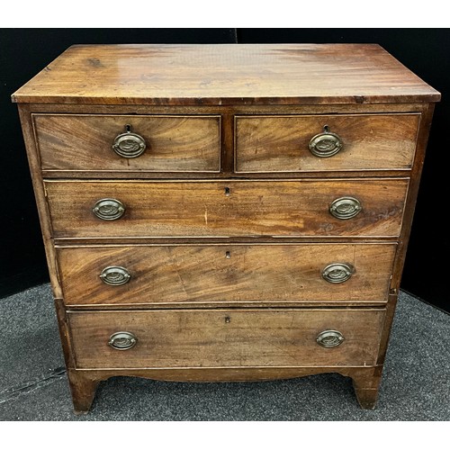 95 - A George III mahogany chest of drawers, two short, above three graduated drawers, splayed bracket fe... 