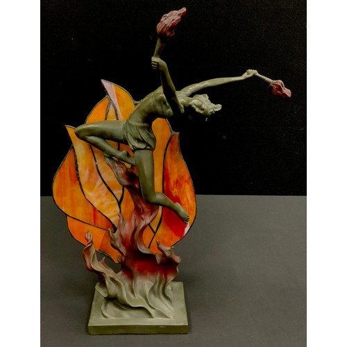 107 - Art Deco bronzed metal lamp of figure dancing in fire, holding torches, with marbleized glass back d... 