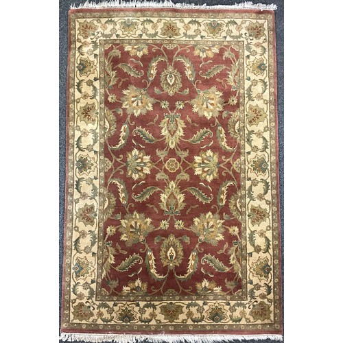 110 - An Indo-Persian Keshan type deep pile woollen rug, 241cm x 156cm.