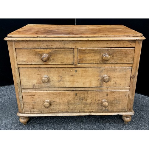 117 - A Victorian pine chest of drawers, two short, over two long drawers, turned feet, 77.5cm high x 95cm... 