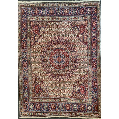 120 - A North East Persian Moud Carpet central medallion, multi-tone field, 295cm x 215cm