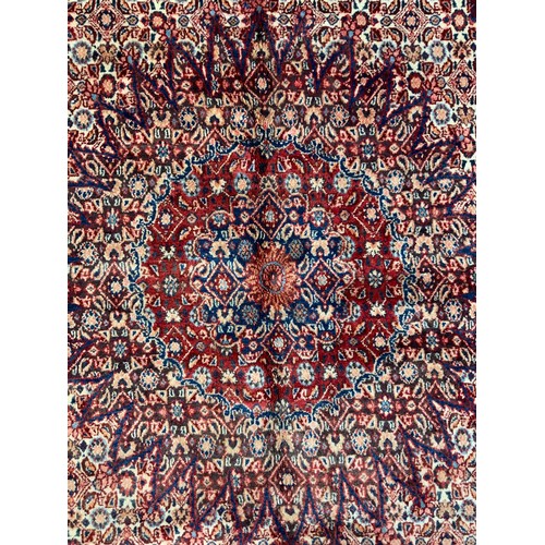 120 - A North East Persian Moud Carpet central medallion, multi-tone field, 295cm x 215cm