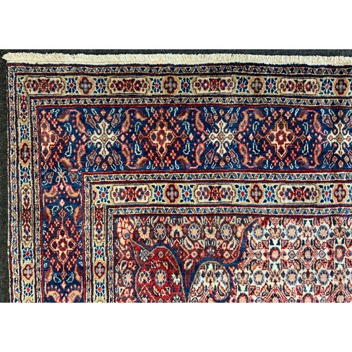 120 - A North East Persian Moud Carpet central medallion, multi-tone field, 295cm x 215cm